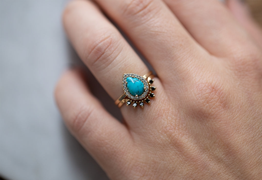 The Dahlia Ring with a Sleeping Beauty Turquoise with ROund Diamond Sunburst Stacking Band on Model