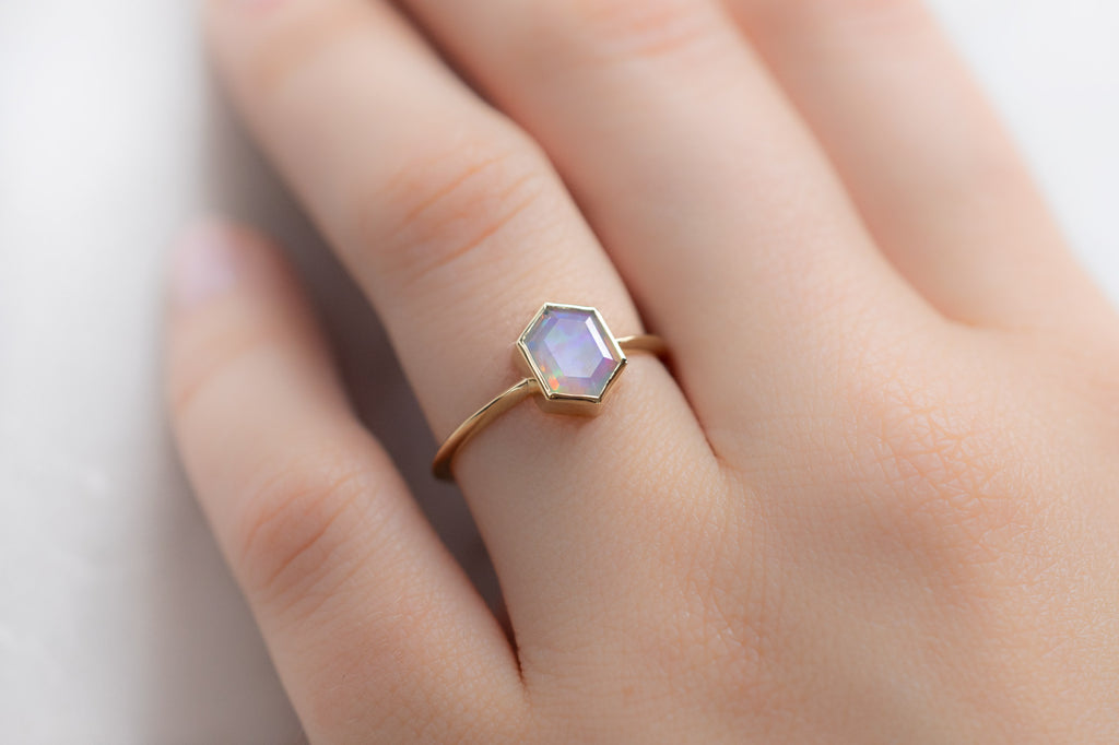 The Hazel Ring with an Opal Hexagon on Model