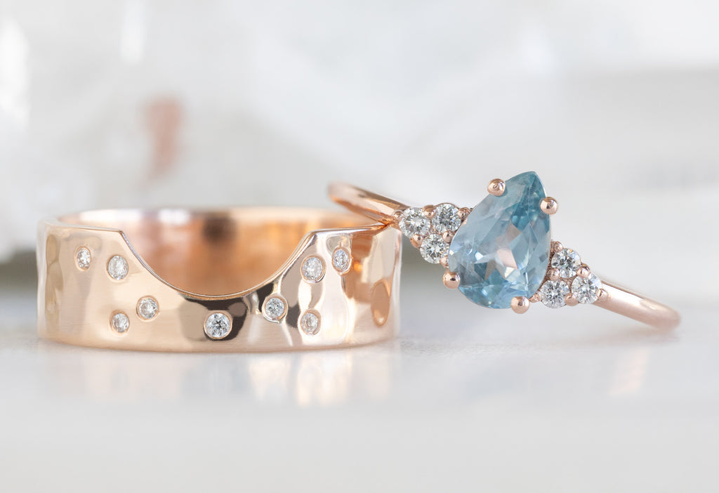 The Ivy Ring with a Pear-Cut Montana Sapphire with Constellation Cut-Out Stacking Band